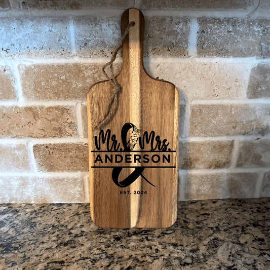 17"x7" Acacia wood cutting board with handle