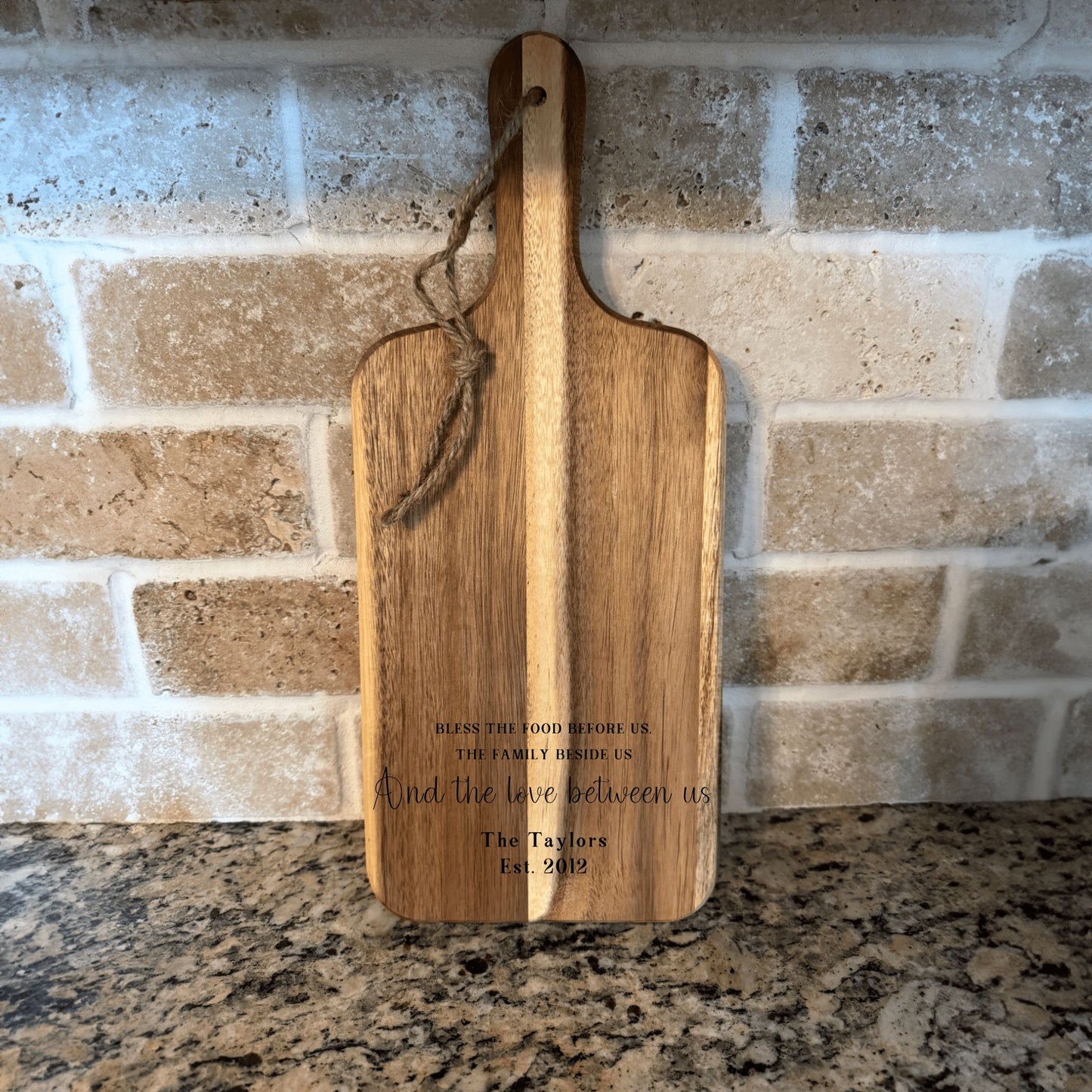 17"x7" Acacia wood cutting board with handle